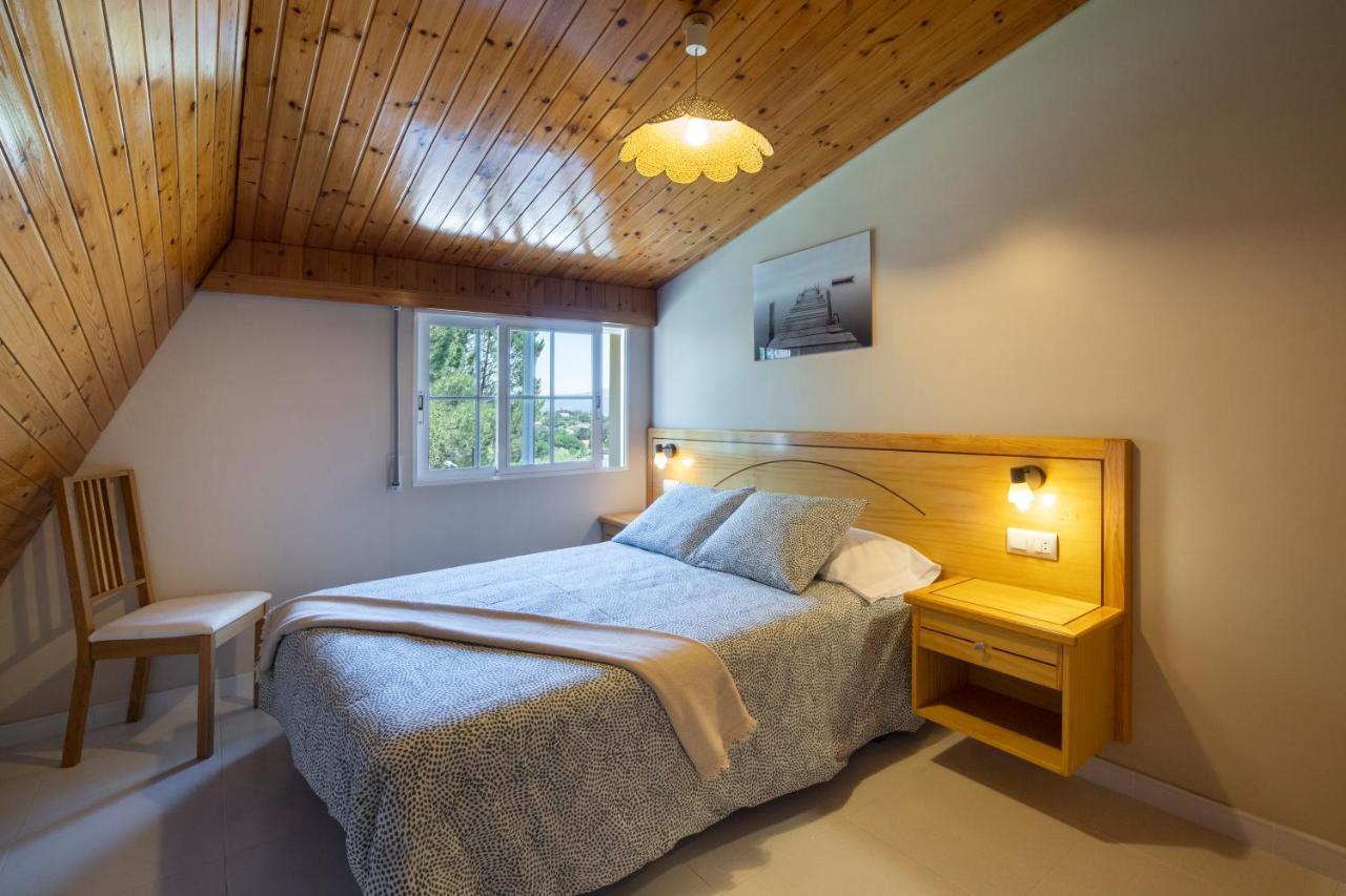 Apartamentos En Playa Canelas Portonovo Exteriör bild